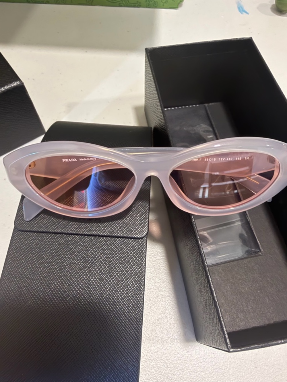 Prada Pink Cat-Eye Sunglasses with Rose-Tinted Lenses